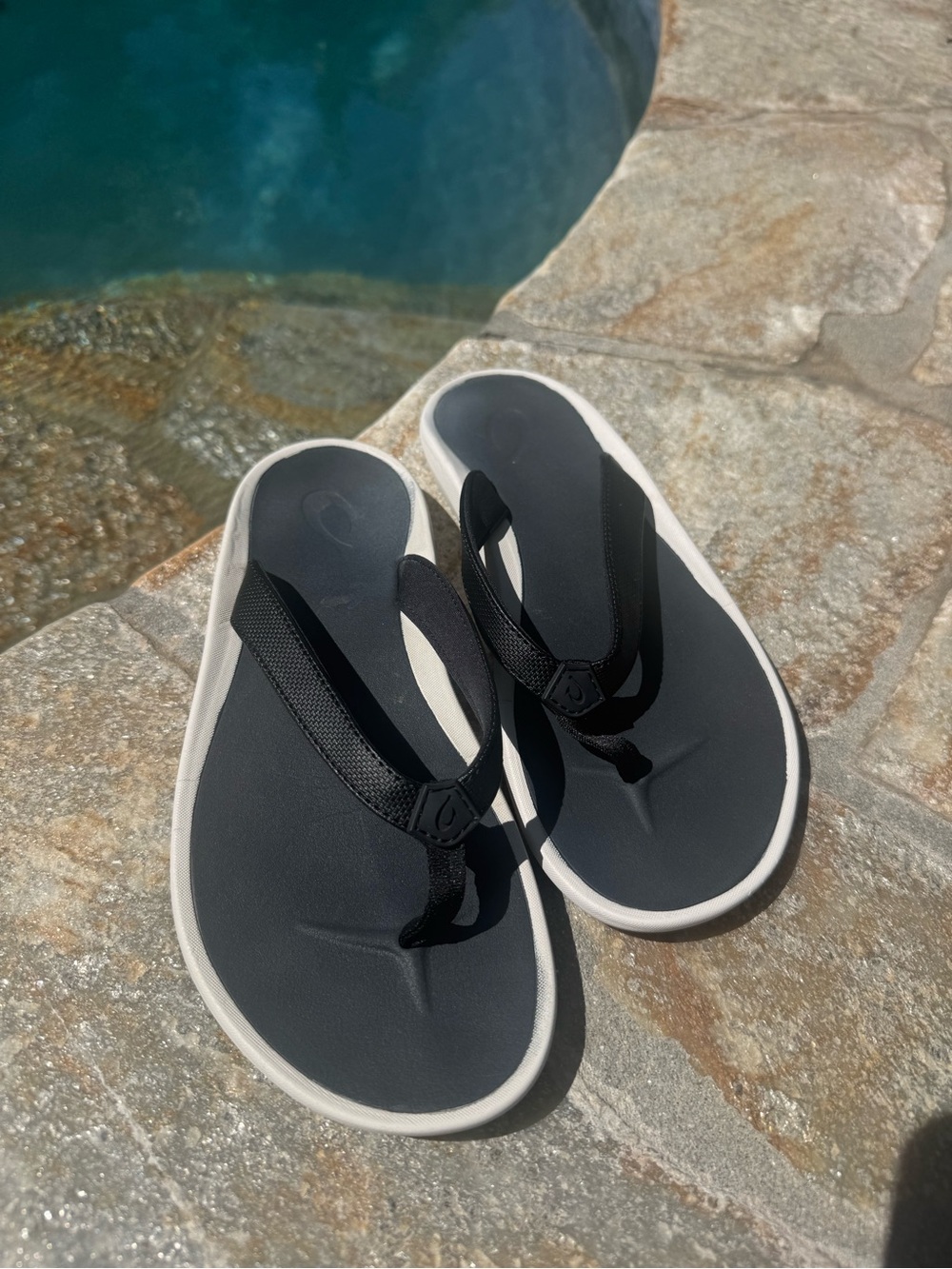 OluKai Black Flip Flop Sandals with White Trim - Women